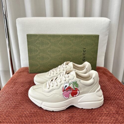 sy_no_B19FB71E6F984A5C2362C7A92C41B479_0 Gucci Rhyton Cherry Print Leather Sneaker in Off-White