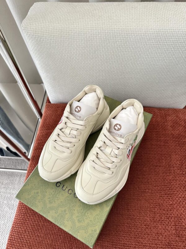 sy_no_B19FB71E6F984A5C2362C7A92C41B479_1 Gucci Rhyton Cherry Print Leather Sneaker in Off-White