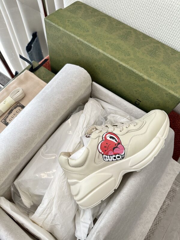 sy_no_B19FB71E6F984A5C2362C7A92C41B479_3 Gucci Rhyton Cherry Print Leather Sneaker in Off-White