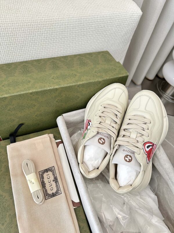 sy_no_B19FB71E6F984A5C2362C7A92C41B479_4 Gucci Rhyton Cherry Print Leather Sneaker in Off-White