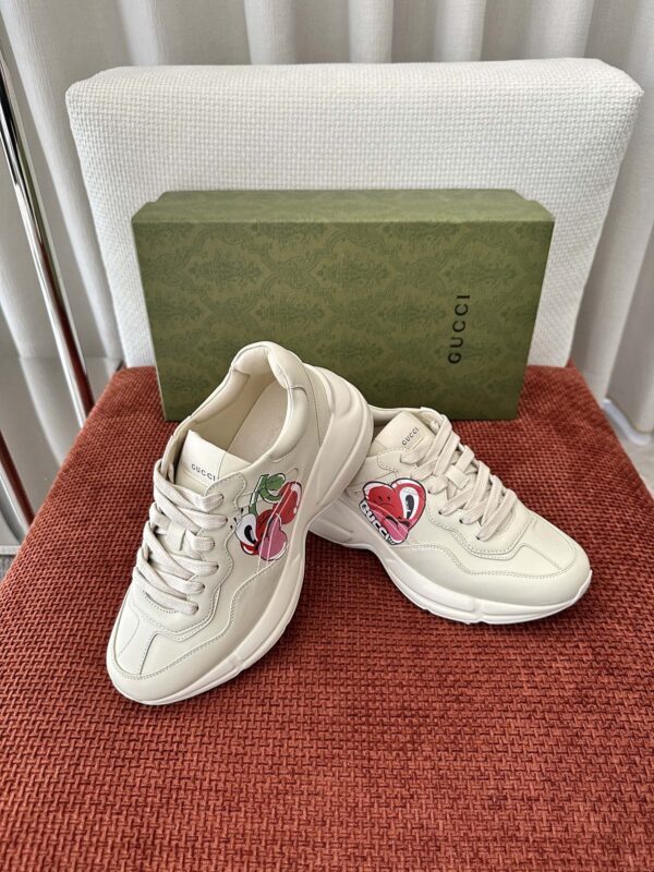sy_no_B19FB71E6F984A5C2362C7A92C41B479_7 Gucci Rhyton Cherry Print Leather Sneaker in Off-White