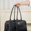 CHANEL Women's Large Bowling Bag (26S) – Black Calfskin with Gold Logo (Spring/Summer 2026 New Arrival)