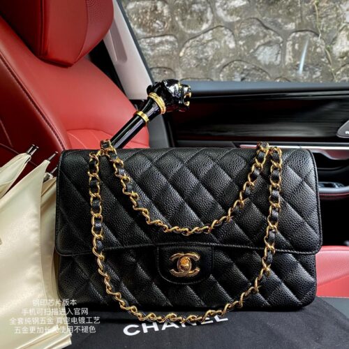 Chanel Classic CF 1112 shoulder bag featuring a chain strap and lock closure, crafted from premium imported caviar-grained calfskin.