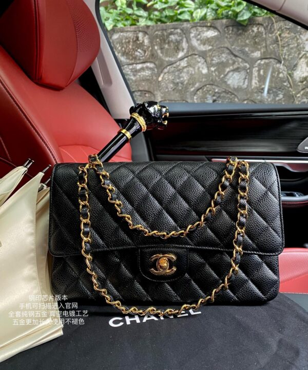 sy_no_BA3037C3101F840EB2D3087C853D4CA8_0 Chanel Classic CF 1112 shoulder bag featuring a chain strap and lock closure, crafted from premium imported caviar-grained calfskin.