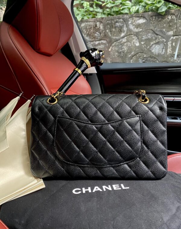 sy_no_BA3037C3101F840EB2D3087C853D4CA8_2 Chanel Classic CF 1112 shoulder bag featuring a chain strap and lock closure, crafted from premium imported caviar-grained calfskin.