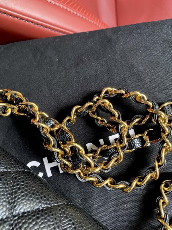 sy_no_BA3037C3101F840EB2D3087C853D4CA8_5 Chanel Classic CF 1112 shoulder bag featuring a chain strap and lock closure, crafted from premium imported caviar-grained calfskin.