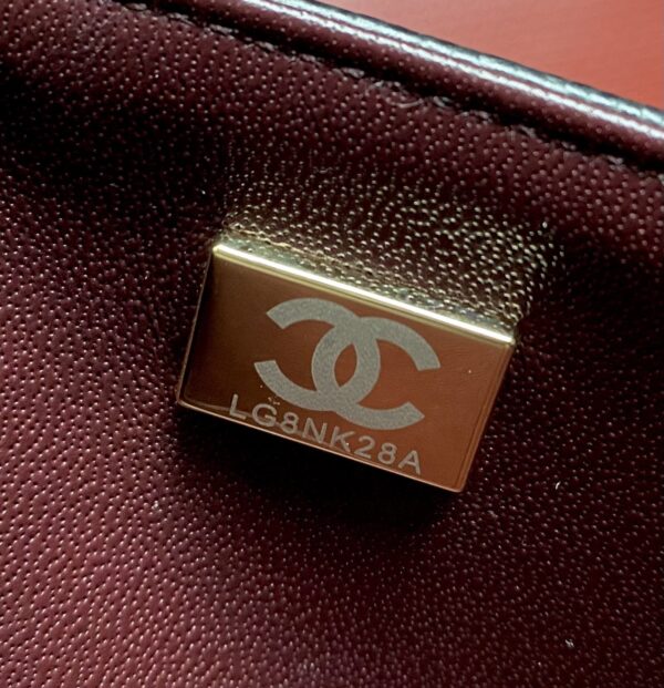 sy_no_BA3037C3101F840EB2D3087C853D4CA8_8 Chanel Classic CF 1112 shoulder bag featuring a chain strap and lock closure, crafted from premium imported caviar-grained calfskin.