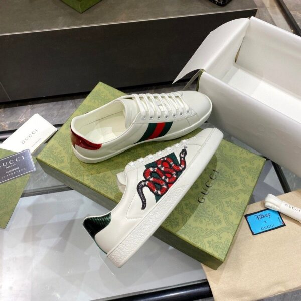sy_no_C1D52799ADB565A52A10331F7A50462F_3 Gucci Ace Embroidered Kingsnake Sneaker – White / Multicolor