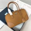 sy_no_C5B2BCA0E49F7D006A2DB7EAF220A04D_0 Prada Debut: 2024 Cruise Collection Re-Edition 1978 Double-Handle Bag