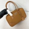 sy_no_C5B2BCA0E49F7D006A2DB7EAF220A04D_1 Prada Debut: 2024 Cruise Collection Re-Edition 1978 Double-Handle Bag