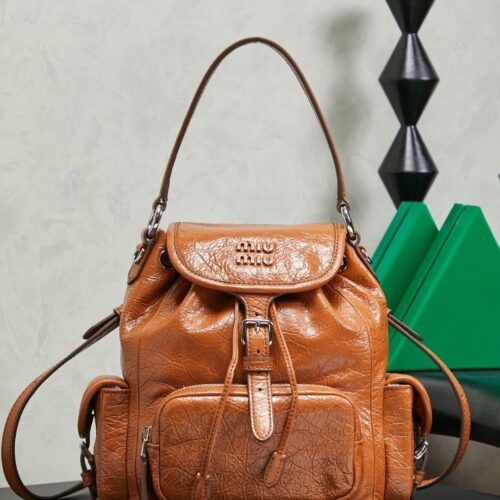 sy_no_CA05EF996645053D6EE89BAA905D989F_0 Miu Miu Medium Calfskin Backpack/Crossbody/Handbag with Crackled Finish