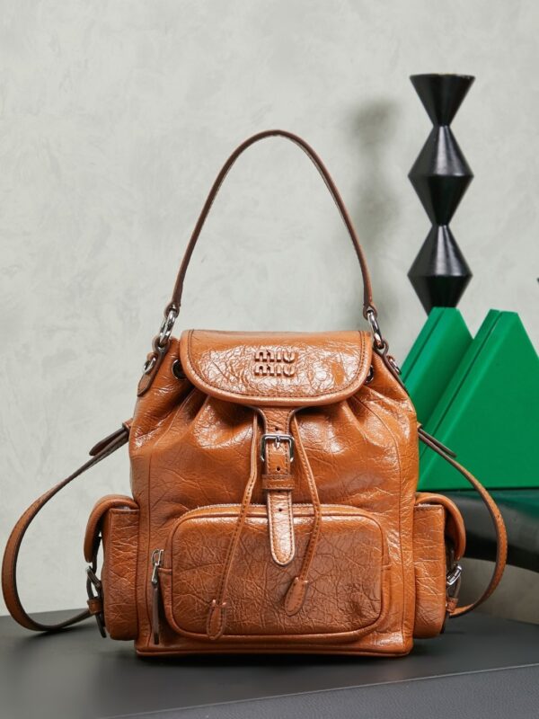 sy_no_CA05EF996645053D6EE89BAA905D989F_0 Miu Miu Medium Calfskin Backpack/Crossbody/Handbag with Crackled Finish
