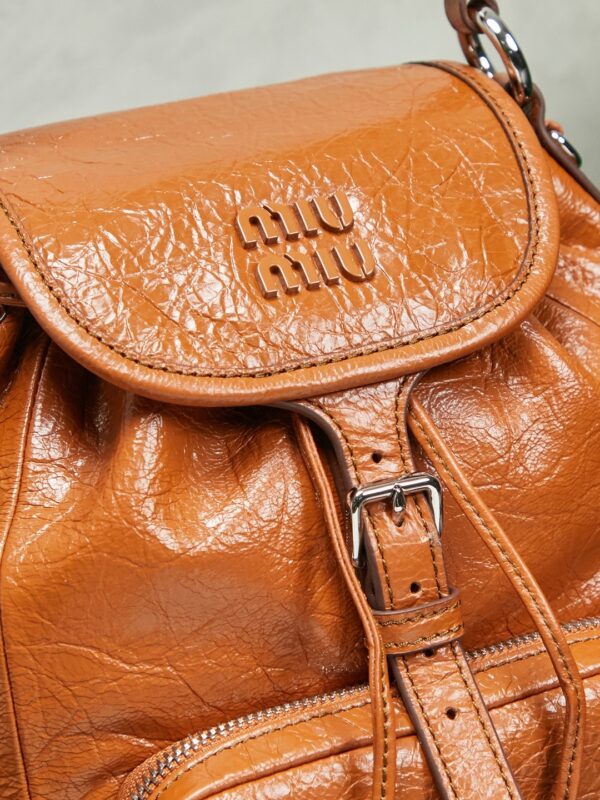 sy_no_CA05EF996645053D6EE89BAA905D989F_6 Miu Miu Medium Calfskin Backpack/Crossbody/Handbag with Crackled Finish