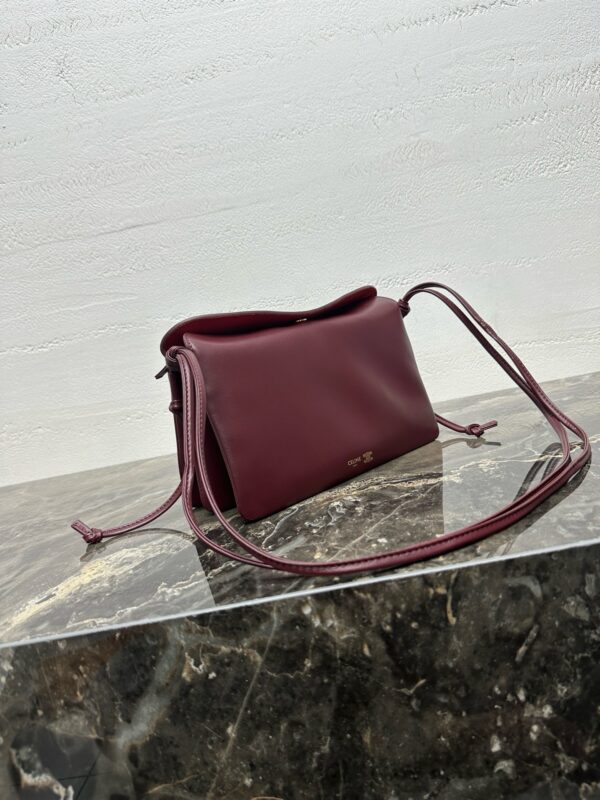 sy_no_CA7E6ACD012425DE6502A01AD414B3C7_1 Trio Flap Bag – Red
