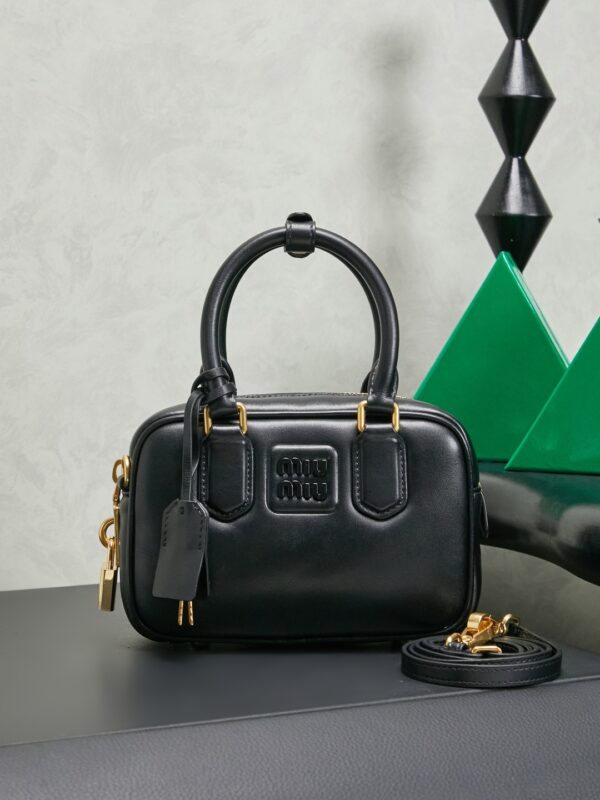sy_no_D03C03934D934462141AD8A24D118F9C_0 Miu Miu "Too Pretty" Bowling Bag – Small Leather Handbag / Crossbody Bag