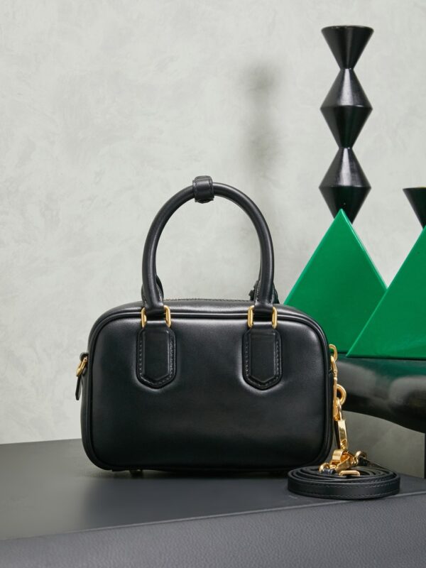 sy_no_D03C03934D934462141AD8A24D118F9C_1 Miu Miu "Too Pretty" Bowling Bag – Small Leather Handbag / Crossbody Bag