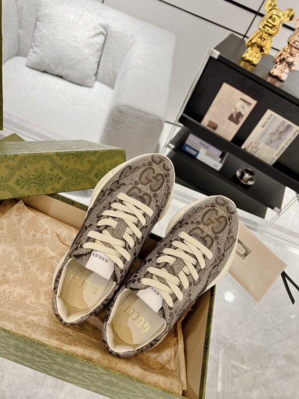 sy_no_D150456A1E99053AF3E901DFBD2BB804_3 Gucci Rhyton GG Canvas Sneaker – Beige / Ebony