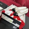 sy_no_D74E968460683EA1651DC99FD9D9BC47_0 White & Black Patent Cap-Toe Chain Ballerinas