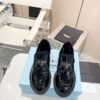 sy_no_DC52EB1AB5D263546D6D53F65E1DBAE9_3 Black Patent Leather Shearling-Lined Platform Loafers