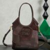 sy_no_DCAA339681ED9A31CFB625E1096E1D56_0 Miu Miu Spring/Summer Mixed-Material Mini Tote Bag – Briarwood color.