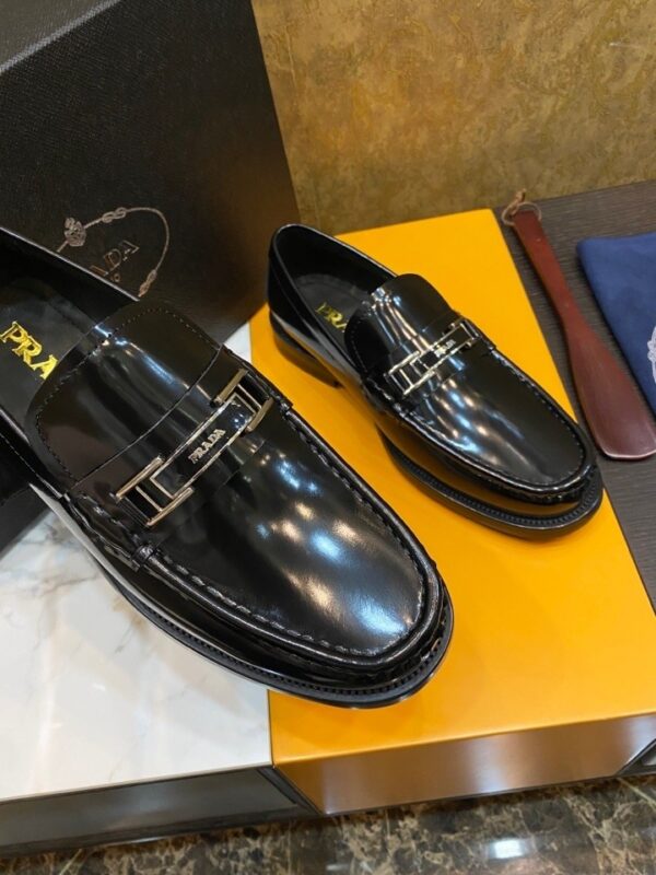 sy_no_E163A188E9D08E58E93B96CD05175790_3 Prada Black Brushed Leather Metal Bar Loafers