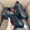 sy_no_E195AFA611CC3D538FC5EA334C79C1E0_1 Black Textured Leather Vibram® Lug-Sole Slip-On Sneakers