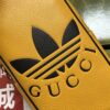 sy_no_E1FA4F9F8C39317DF896B590E2CFE7D5_5 adidas x Gucci Mini Leather Wash Bag – Black