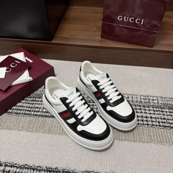 sy_no_E4F21EDBD509E86040858889F1B2E534_0 Gucci Re-Web Sneaker in Black & White Leather with White Sole