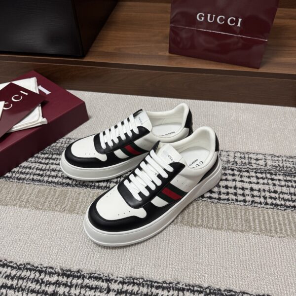 sy_no_E4F21EDBD509E86040858889F1B2E534_2 Gucci Re-Web Sneaker in Black & White Leather with White Sole