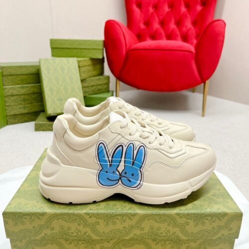 sy_no_E6E22C15A7144F701AD72E69E987799D_0 Gucci Rhyton Leather Sneaker in Off-White