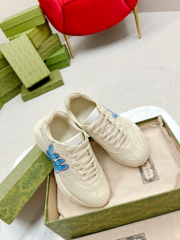 sy_no_E6E22C15A7144F701AD72E69E987799D_4 Gucci Rhyton Leather Sneaker in Off-White
