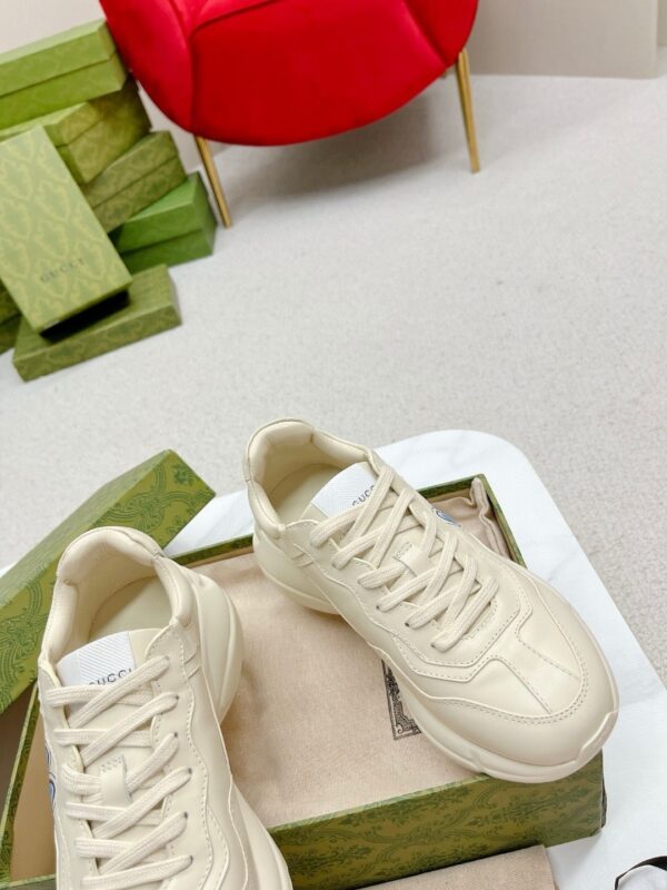 sy_no_E6E22C15A7144F701AD72E69E987799D_5 Gucci Rhyton Leather Sneaker in Off-White