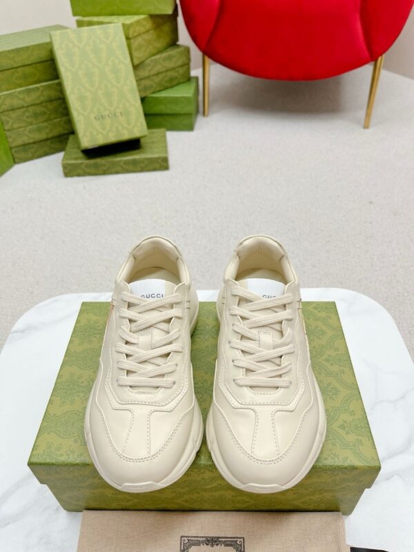 sy_no_ED229C4A1F87089D0ECDF36DDE9638B8_1 Gucci Rhyton Leather Sneaker in Off-White