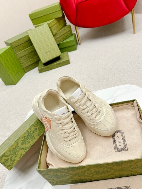 sy_no_ED229C4A1F87089D0ECDF36DDE9638B8_5 Gucci Rhyton Leather Sneaker in Off-White
