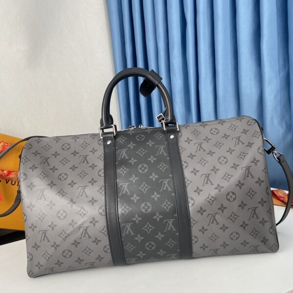 sy_no_EFAF865FD25E8B6B3138885D6E597E2E_2 Louis Vuitton Keepall Bandoulière 50 – Monogram Eclipse Reverse