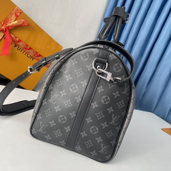 sy_no_EFAF865FD25E8B6B3138885D6E597E2E_3 Louis Vuitton Keepall Bandoulière 50 – Monogram Eclipse Reverse
