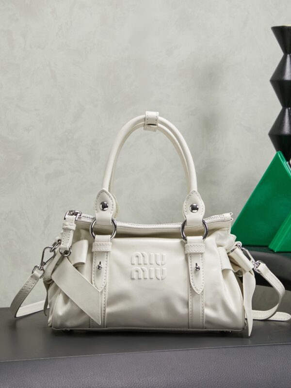 sy_no_F17E8E08AEF5B4F220FF8CADAAC0A126_0 Miu Miu New Motorcycle Bow Shoulder Bag