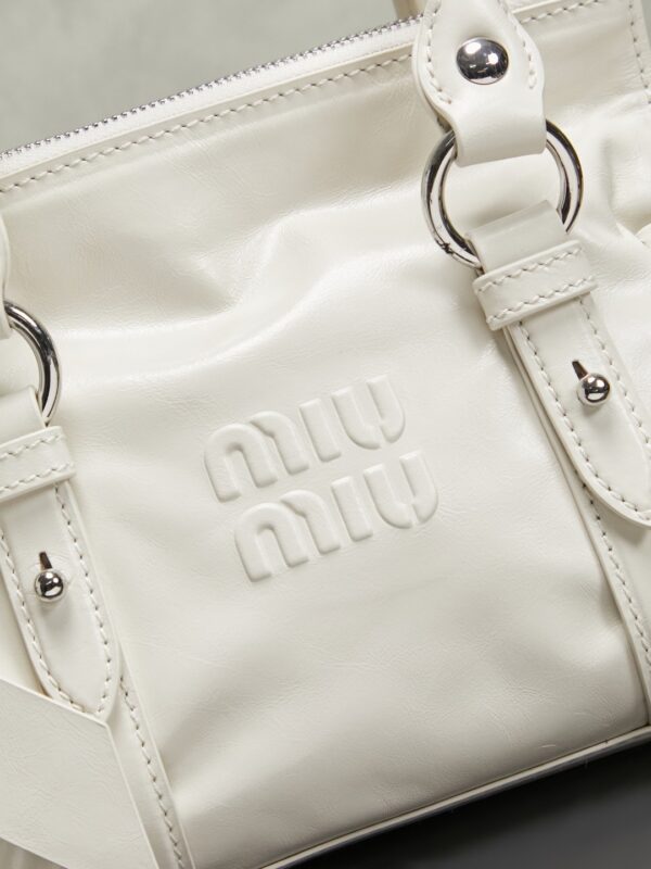 sy_no_F17E8E08AEF5B4F220FF8CADAAC0A126_4 Miu Miu New Motorcycle Bow Shoulder Bag