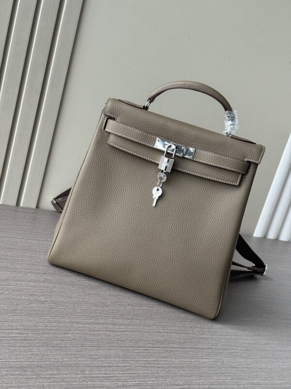 sy_no_F7B2AFD84D4F2080F67362212BBD7B1A_0 Kelly Ado 28 Backpack – Elephant Gray Togo Leather