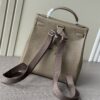 sy_no_F7B2AFD84D4F2080F67362212BBD7B1A_1 Kelly Ado 28 Backpack – Elephant Gray Togo Leather