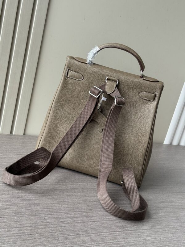 sy_no_F7B2AFD84D4F2080F67362212BBD7B1A_1 Kelly Ado 28 Backpack – Elephant Gray Togo Leather
