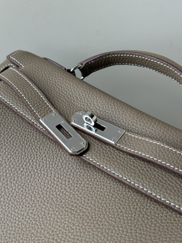 sy_no_F7B2AFD84D4F2080F67362212BBD7B1A_3 Kelly Ado 28 Backpack – Elephant Gray Togo Leather