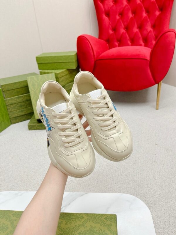 sy_no_FA8D5BA456D0E52A45080C3F491586C2_2 Gucci Rhyton Leather Sneaker in Off-White