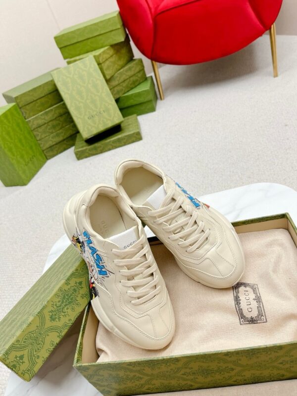 sy_no_FA8D5BA456D0E52A45080C3F491586C2_5 Gucci Rhyton Leather Sneaker in Off-White