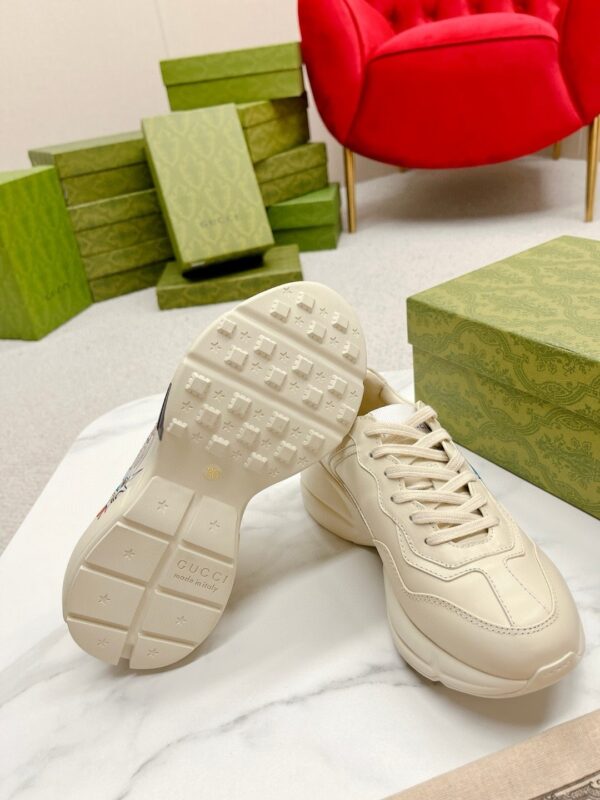 sy_no_FA8D5BA456D0E52A45080C3F491586C2_8 Gucci Rhyton Leather Sneaker in Off-White