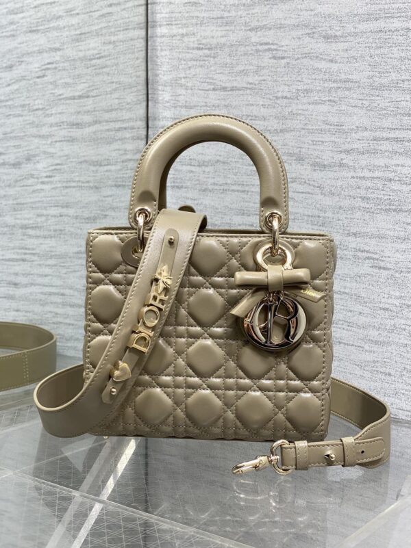 sy_no_FFBC861D7E1B18C8A1DC02B1C23ED8DD_0 Lady Four-Compartment Bow Bag