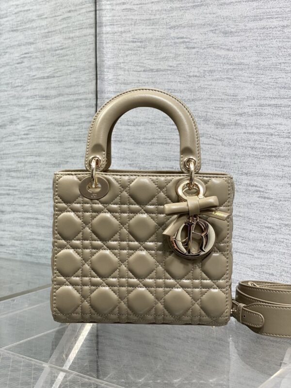 sy_no_FFBC861D7E1B18C8A1DC02B1C23ED8DD_1 Lady Four-Compartment Bow Bag