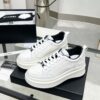 sy_no_01621E16CAFAD214C747CBB7D37737FB_1 Chanel White-Black Mixed-Material Platform Low-Top Sneaker with Embossed CC Logo