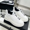 sy_no_01621E16CAFAD214C747CBB7D37737FB_2 Chanel White-Black Mixed-Material Platform Low-Top Sneaker with Embossed CC Logo