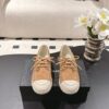 Chanel Brown Suede Low-Top Shoe with Cap-Toe & CC Chain Detail